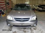 ✅ 2001 Mazda Tribute LX • VIN: 4F2CU08101KM05943 • Lot: 84077694. Wystawiony na Copart z przebiegiem 137 937 mil. Bezpłatny archiwum sprzedaży aukcyjnych z USA i szczegółowy raport historii pojazdu na DreamBid. Zdjęcie 5.