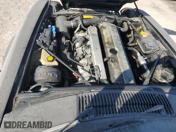 ✅ 1995 Jaguar XJS • VIN: SAJNX2748SC198836 • Лот: 75833334. Опубликован ранее на Copart с пробегом 145 794 миль. Бесплатный доступ к архиву аукционных продаж из США и подробный отчёт об истории автомобиля на DreamBid. Изображение 11.