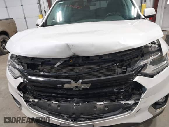 2019 Chevrolet Traverse LT Cloth z VIN 1GNEVGKW1KJ298306, wystawiony jako IAAI lot #43302460 z przebiegiem 76 785 mil mil oraz . Historia ofert i sprzedaży dostępna na DreamBid. Obrazek 6.