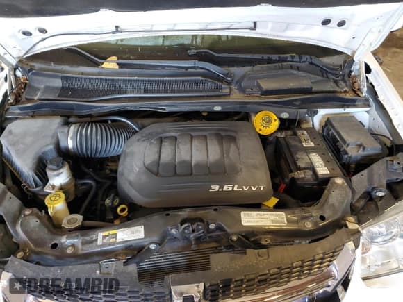 ✅ 2015 Dodge Grand Caravan SXT • VIN: 2C4RDGCG8FR683559 • Lot: 85571445. Listed on Copart with 129,893 mi. Free auction sales archive from the USA and detailed vehicle history report at DreamBid. Image 12.