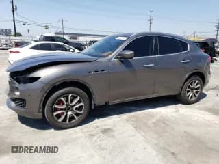 ✅ 2019 Maserati Levante S • VIN: ZN661YUAXKX313879 • Лот: 64864094. Опубликован ранее на Copart с пробегом 52 115 миль. Бесплатный доступ к архиву аукционных продаж из США и подробный отчёт об истории автомобиля на DreamBid. Изображение 1.
