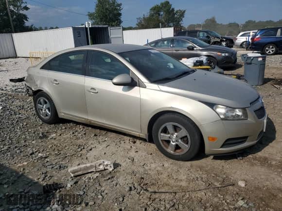 2014 Chevrolet Cruze 1LT z VIN 1G1PC5SB3E7201819, wystawiony jako Copart lot #81291755 z przebiegiem 124 943 mil mil oraz Szkoda całkowita • Salvage title. Historia ofert i sprzedaży dostępna na DreamBid. Obrazek 4.