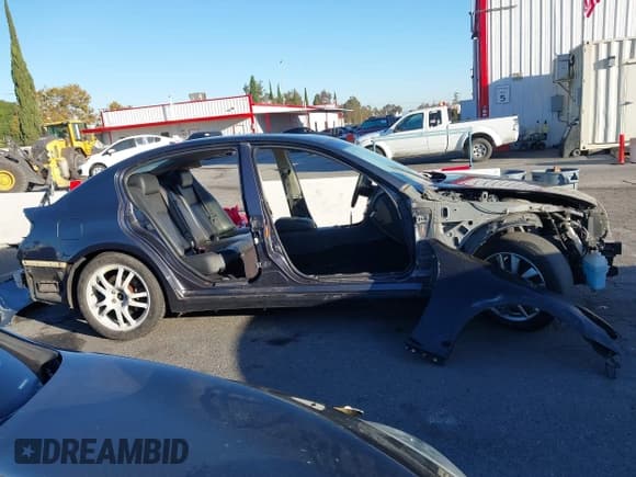 ✅ 2009 Infiniti G37 Journey • VIN: JNKCV61E59M301668 • Lot: 43473107. Listed on IAAI with 174,630 mi. Free auction sales archive from the USA and detailed vehicle history report at DreamBid. Image 14.