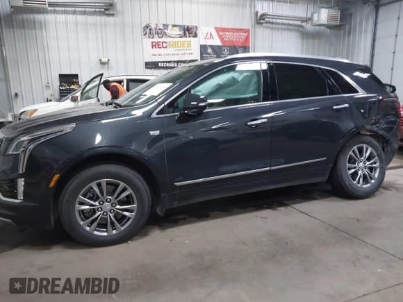 ✅ 2023 Cadillac XT5 AWD Premium Luxury • VIN: 1GYKNDRS2PZ122350 • Lot: 42123718. Listed on IAAI with 17,971 mi. Free auction sales archive from the USA and detailed vehicle history report at DreamBid. Image 14.