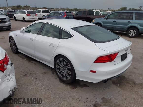 ✅ 2014 Audi A7 Prestige • VIN: WAU2GAFC1EN059769 • Лот: 43778932. Опубликован ранее на IAAI с пробегом 183 189 миль. Бесплатный доступ к архиву аукционных продаж из США и подробный отчёт об истории автомобиля на DreamBid. Изображение 3.