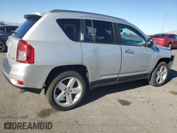 ✅ 2013 Jeep Compass Limited • VIN: 1C4NJDCB6DD190599 • Lot: 90139535. Listed on Copart with 107,672 mi. Free auction sales archive from the USA and detailed vehicle history report at DreamBid. Image 3.
