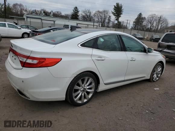 2013 Hyundai Azera z VIN KMHFH4JG7DA303424, wystawiony jako Copart lot #49836175 z przebiegiem 139 439 mil mil oraz Czysty tytuł • Clean title. Historia ofert i sprzedaży dostępna na DreamBid. Obrazek 3.
