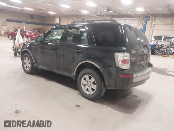 2010 Mercury Mariner with VIN 4M2CN9BG0AKJ06493, listed as a IAAI auction lot 41199173 with 143,631 mi miles and . Bid and sale history available at DreamBid. Image 3.