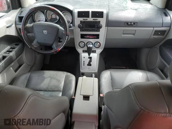 2007 Dodge Caliber R/T z VIN 1B3HE78K77D582945, wystawiony jako Copart lot #74854124 z przebiegiem 173 818 mil mil oraz Nie do naprawy • Non repairable. Historia ofert i sprzedaży dostępna na DreamBid. Obrazek 8.