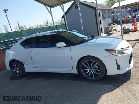 ✅ 2014 Scion tC • VIN: JTKJF5C72E3079582 • Lot: 41934819. Listed on IAAI with 179,881 mi. Free auction sales archive from the USA and detailed vehicle history report at DreamBid. Image 13.