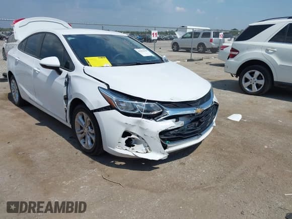 ✅ 2019 Chevrolet Cruze LS • VIN: 1G1BC5SM1K7110801 • Lot: 43252138. Listed on IAAI with 126,551 mi. Free auction sales archive from the USA and detailed vehicle history report at DreamBid. Image 6.