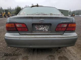 ✅ 1999 Toyota Avalon XL • VIN: 4T1BF18B4XU292141 • Лот: 65086524. Опубликован ранее на Copart с пробегом Не указан. Бесплатный доступ к архиву аукционных продаж из США и подробный отчёт об истории автомобиля на DreamBid. Изображение 6.