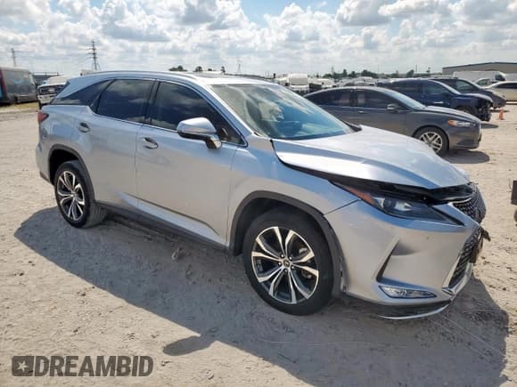 ✅ 2022 Lexus RX 350L • VIN: JTJHZKEA9N2028507 • Lot: 82072945. Wystawiony na Copart z przebiegiem 26 418 mil. Bezpłatny archiwum sprzedaży aukcyjnych z USA i szczegółowy raport historii pojazdu na DreamBid. Zdjęcie 4.