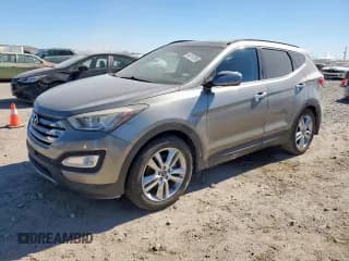 ✅ 2015 Hyundai Santa Fe • VIN: 5XYZW4LA9FG240068 • Лот: 90757385. Опубликован ранее на Copart с пробегом 131 543 миль. Бесплатный доступ к архиву аукционных продаж из США и подробный отчёт об истории автомобиля на DreamBid. Изображение 1.