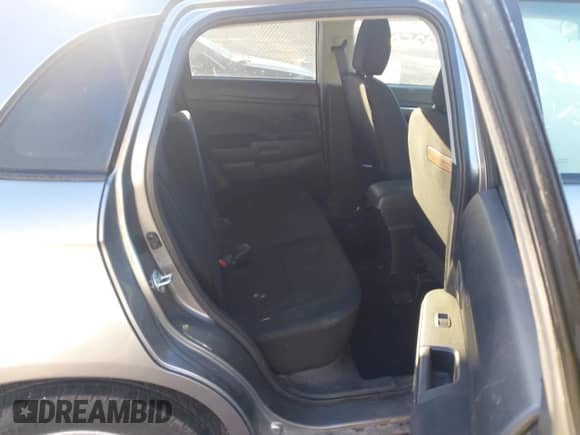 2013 Mitsubishi Outlander ES z VIN 4A4AR3AU3DE017955, wystawiony jako IAAI lot #43422506 z przebiegiem 153 214 mil mil oraz . Historia ofert i sprzedaży dostępna na DreamBid. Obrazek 8.