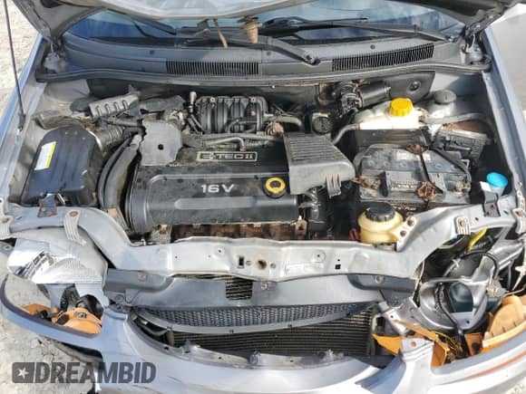 2006 Chevrolet Aveo LS z VIN KL1TD66676B670083, wystawiony jako Copart lot #68493464 z przebiegiem 193 000 mil mil oraz Szkoda całkowita • Salvage title. Historia ofert i sprzedaży dostępna na DreamBid. Obrazek 13.