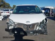 ✅ 2014 Toyota Sienna LE • VIN: 5TDKK3DCXES434133 • Lot: 43587885. Listed on IAAI with 111,272 mi. Free auction sales archive from the USA and detailed vehicle history report at DreamBid. Image 13.