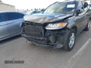 ✅ 2012 Hyundai Santa Fe Limited • VIN: 5XYZKDAG3CG136593 • Лот: 43417533. Опубликован ранее на IAAI с пробегом 71 725 миль. Бесплатный доступ к архиву аукционных продаж из США и подробный отчёт об истории автомобиля на DreamBid. Изображение 14.