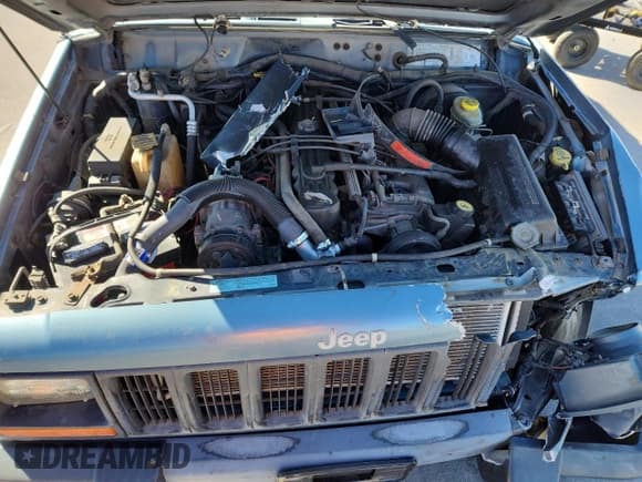 ✅ 1997 Jeep Cherokee Sport • VIN: 1J4FJ67S9VL584495 • Lot: 82619125. Listed on Copart with 189,656 mi. Free auction sales archive from the USA and detailed vehicle history report at DreamBid. Image 12.