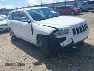 ✅ 2014 Jeep Grand Cherokee Overland • VIN: 1C4RJFCG0EC238873 • Lot: 42436535. Listed on IAAI with 154,384 mi. Free auction sales archive from the USA and detailed vehicle history report at DreamBid. Image 1.