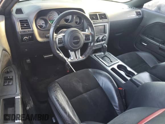 2013 Dodge Challenger SRT-8 с VIN 2C3CDYCJ1DH629258, выставлен на аукционе Copart как лот 84020745 с пробегом 193 657 миль миль и Списание • Salvage title. История ставок и продаж доступна на DreamBid. Изображение 8.