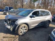 ✅ 2022 Honda Pilot Touring 7-Passenger • VIN: 5FNYF6H62NB010647 • Лот: 41199560. Опубликован ранее на IAAI с пробегом 102 066 миль. Бесплатный доступ к архиву аукционных продаж из США и подробный отчёт об истории автомобиля на DreamBid. Изображение 14.