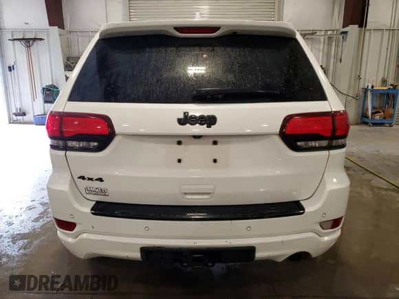 2018 Jeep Grand Cherokee Altitude z VIN 1C4RJFAG4JC397098, wystawiony jako Copart lot #82310585 z przebiegiem 138 914 mil mil oraz Szkoda całkowita • Salvage title. Historia ofert i sprzedaży dostępna na DreamBid. Obrazek 6.