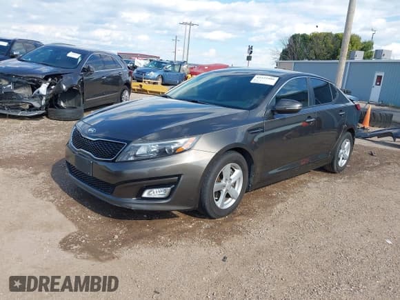 ✅ 2014 Kia Optima LX • VIN: 5XXGM4A7XEG284037 • Lot: 43225986. Listed on IAAI with 115,054 mi. Free auction sales archive from the USA and detailed vehicle history report at DreamBid. Image 18.