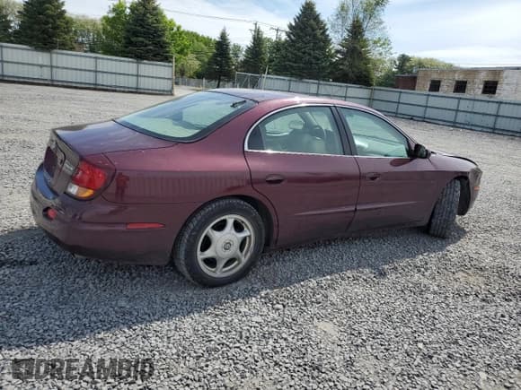 ✅ 2003 Oldsmobile Aurora • VIN: 1G3GS64C134163544 • Lot: 58706705. Listed on Copart with 104,447 mi. Free auction sales archive from the USA and detailed vehicle history report at DreamBid. Image 3.