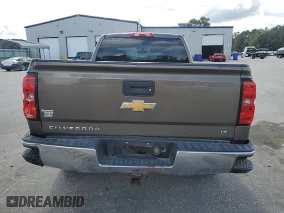 2014 Chevrolet Silverado 1500 LT с VIN 1GCVKREC3EZ300772, выставлен на аукционе Copart как лот 70127165 с пробегом 208 135 миль миль и Списание • Salvage title. История ставок и продаж доступна на DreamBid. Изображение 6.