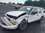 ✅ 1997 GMC Jimmy SLT • VIN: 1GKDT13WXV2569372 • Lot: 42667097. Listed on IAAI with 149,076 mi. Free auction sales archive from the USA and detailed vehicle history report at DreamBid. Image 2.