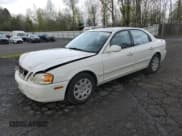 ✅ 2004 Kia Optima LX • VIN: KNAGD126745350564 • Лот: 78632014. Опубликован ранее на Copart с пробегом 174 765 миль. Бесплатный доступ к архиву аукционных продаж из США и подробный отчёт об истории автомобиля на DreamBid. Изображение 1.