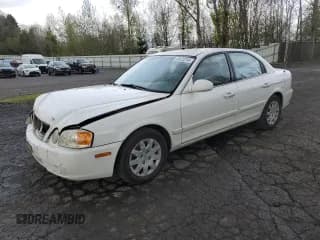 ✅ 2004 Kia Optima LX • VIN: KNAGD126745350564 • Lot: 78632014. Wystawiony na Copart z przebiegiem 174 765 mil. Bezpłatny archiwum sprzedaży aukcyjnych z USA i szczegółowy raport historii pojazdu na DreamBid. Zdjęcie 1.