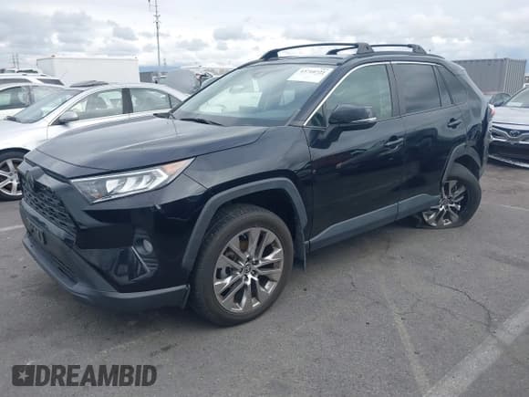 ✅ 2019 Toyota RAV4 XLE Premium • VIN: JTMC1RFV3KD041641 • Lot: 43710721. Listed on IAAI with 54,833 mi. Free auction sales archive from the USA and detailed vehicle history report at DreamBid. Image 2.