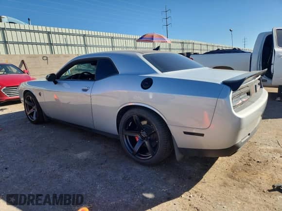 2019 Dodge Challenger SRT Hellcat с VIN 2C3CDZC99KH759457, выставлен на аукционе Copart как лот 87033995 с пробегом 33 883 миль миль и Списание • Salvage title. История ставок и продаж доступна на DreamBid. Изображение 2.
