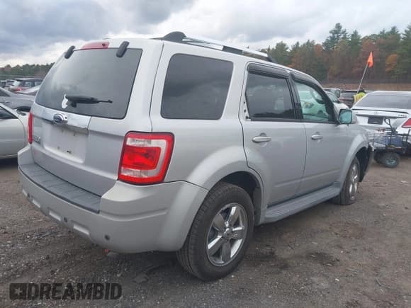 ✅ 2009 Ford Escape Limited • VIN: 1FMCU04G39KA92288 • Lot: 43573741. Listed on IAAI with 143,621 mi. Free auction sales archive from the USA and detailed vehicle history report at DreamBid. Image 4.