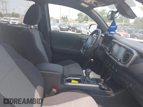 ✅ 2023 Toyota Tacoma SR5 • VIN: 3TMDZ5BN5PM142395 • Lot: 42948374. Listed on IAAI with 36,490 mi. Free auction sales archive from the USA and detailed vehicle history report at DreamBid. Image 5.