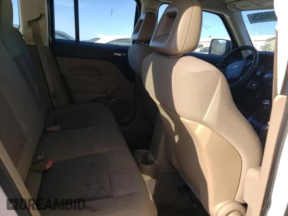 ✅ 2009 Jeep Patriot Sport • VIN: 1J4FT28A59D196026 • Лот: 87096525. Опубликован ранее на Copart с пробегом 163 514 миль. Бесплатный доступ к архиву аукционных продаж из США и подробный отчёт об истории автомобиля на DreamBid. Изображение 11.