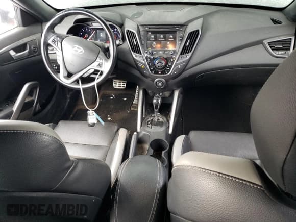 ✅ 2016 Hyundai Veloster Turbo • VIN: KMHTC6AE5GU270521 • Lot: 83511334. Listed on Copart with 197,171 mi. Free auction sales archive from the USA and detailed vehicle history report at DreamBid. Image 8.