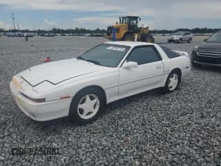 ✅ 1991 Toyota Supra • VIN: JT2MA70M7M0155377 • Лот: 70281745. Опубликован ранее на Copart с пробегом 105 196 миль. Бесплатный доступ к архиву аукционных продаж из США и подробный отчёт об истории автомобиля на DreamBid. Изображение 1.