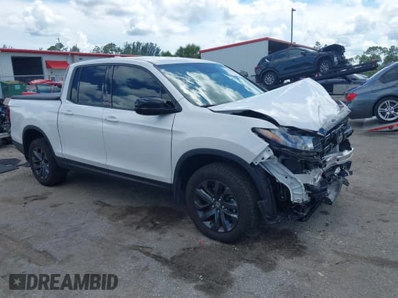 ✅ 2024 Honda Ridgeline Sport • VIN: 5FPYK3F14RB011166 • Lot: 42591313. Listed on IAAI with 5,175 mi. Free auction sales archive from the USA and detailed vehicle history report at DreamBid. Image 1.