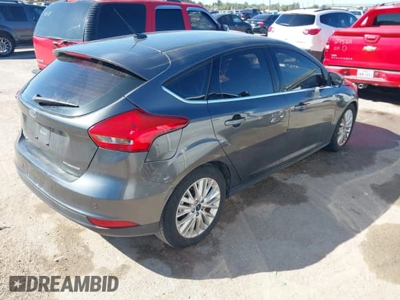✅ 2018 Ford Focus Titanium • VIN: 1FADP3N28JL325672 • Lot: 43422190. Listed on IAAI with 154,407 mi. Free auction sales archive from the USA and detailed vehicle history report at DreamBid. Image 4.