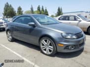 ✅ 2014 Volkswagen Eos Executive • VIN: WVWFW8AHXEV004529 • Лот: 58532495. Опубликован ранее на Copart с пробегом 98 789 миль. Бесплатный доступ к архиву аукционных продаж из США и подробный отчёт об истории автомобиля на DreamBid. Изображение 4.