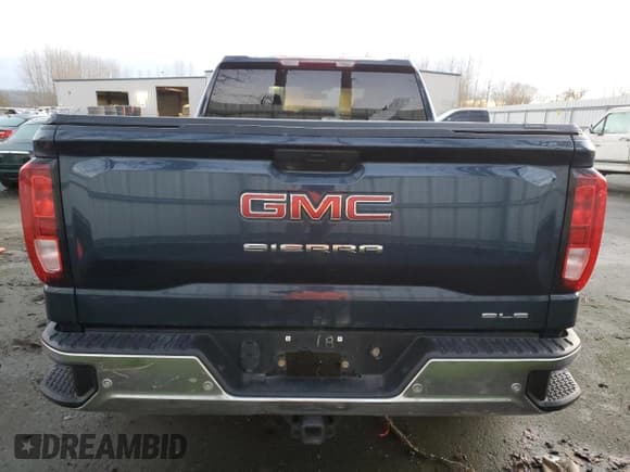 ✅ 2021 GMC Sierra 1500 SLE • VIN: 1GTR9BED9MZ226852 • Лот: 86725224. Опубликован ранее на Copart с пробегом 128 005 миль. Бесплатный доступ к архиву аукционных продаж из США и подробный отчёт об истории автомобиля на DreamBid. Изображение 6.