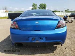 2007 Hyundai Tiburon GT с VIN KMHHN66F17U239526, выставлен на аукционе Copart как лот 64397625 с пробегом 136 807 миль миль и Списание • Salvage title. История ставок и продаж доступна на DreamBid. Изображение 6.