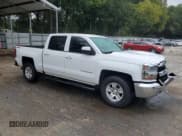 ✅ 2016 Chevrolet Silverado 1500 LT • VIN: 3GCUKREC4GG223327 • Лот: 85378825. Опубликован ранее на Copart с пробегом 135 860 миль. Бесплатный доступ к архиву аукционных продаж из США и подробный отчёт об истории автомобиля на DreamBid. Изображение 4.