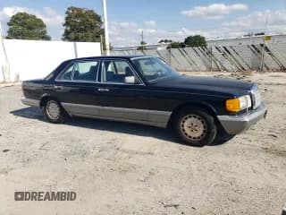 ✅ 1987 Mercedes-Benz 560 • VIN: WDBCA39D3HA355282 • Лот: 74798524. Опубликован ранее на Copart с пробегом 200 535 миль. Бесплатный доступ к архиву аукционных продаж из США и подробный отчёт об истории автомобиля на DreamBid. Изображение 4.