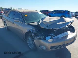 ✅ 2004 Cadillac DeVille DHS • VIN: 1G6KE57Y34U138359 • Lot: 43535083. Listed on IAAI with 84,329 mi. Free auction sales archive from the USA and detailed vehicle history report at DreamBid. Image 6.