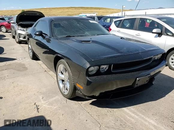 ✅ 2013 Dodge Challenger R/T • VIN: 2C3CDYBTXDH650998 • Lot: 69681514. Wystawiony na Copart z przebiegiem 130 553 mil. Bezpłatny archiwum sprzedaży aukcyjnych z USA i szczegółowy raport historii pojazdu na DreamBid. Zdjęcie 11.