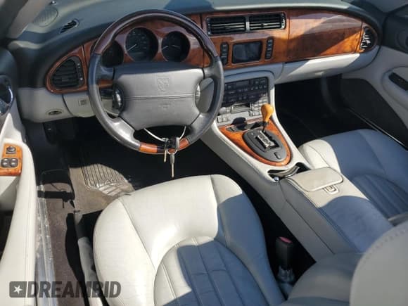 ✅ 2003 Jaguar XK • VIN: SAJDA42C232A32216 • Lot: 80443254. Wystawiony na Copart z przebiegiem Nie podano. Bezpłatny archiwum sprzedaży aukcyjnych z USA i szczegółowy raport historii pojazdu na DreamBid. Zdjęcie 8.